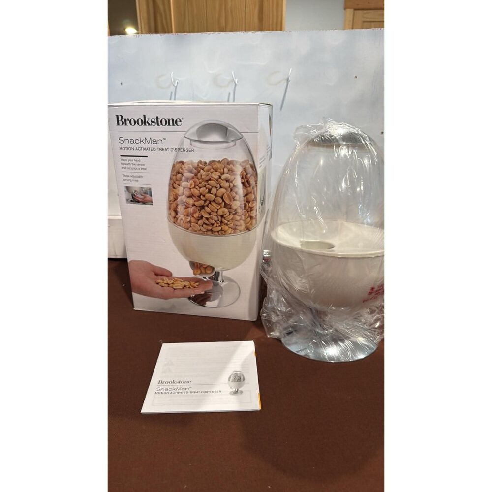 Brookstone Red Snackman Motion Activated Treat Dispenser